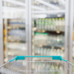 convenience store refrigerator shelves blurred background